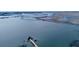 Aerial perspective of the pier over tranquil blue water, providing stunning views and peaceful atmosphere at 1551 Ben Sawyer Blvd # 23, Mount Pleasant, SC 29464