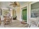 Beautiful screened porch with seating and a ceiling fan, seamlessly blending indoor and outdoor living at 1551 Ben Sawyer Blvd # 23, Mount Pleasant, SC 29464