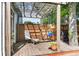 Charming back patio with pergola, swing, grill, and a cozy seating area, perfect for outdoor entertaining at 1572 Pixley St, Charleston, SC 29414