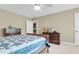 Inviting bedroom with neutral walls, and carpet, featuring wooden furniture, and great natural light at 1572 Pixley St, Charleston, SC 29414