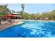 Resort-style community pool area with a covered pavilion, lounge chairs, and ample space for recreation at 1572 Pixley St, Charleston, SC 29414