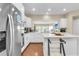 Beautiful kitchen with granite countertops, stainless steel appliances, white cabinetry, and wood flooring at 1572 Pixley St, Charleston, SC 29414