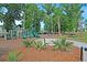 Community playground featuring multiple slides and play structures at 1572 Pixley St, Charleston, SC 29414