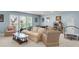 Large rec room with natural light and comfortable seating at 1572 Pixley St, Charleston, SC 29414