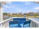 Balcony features outdoor seating with a view of the community pond at 1614 Prince Edward St, Mount Pleasant, SC 29466