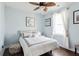Light-filled bedroom with hardwood floors, decorative pillows, and window at 1614 Prince Edward St, Mount Pleasant, SC 29466
