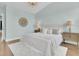 Bright bedroom features a chandelier, two windows, and hardwood floors at 1614 Prince Edward St, Mount Pleasant, SC 29466