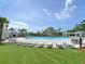A luxurious community pool with lounge chairs, and plenty of seating for residents at 1614 Prince Edward St, Mount Pleasant, SC 29466