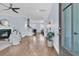 Inviting home entryway, featuring hardwood floors, a cozy fireplace, and an open floor plan at 1614 Prince Edward St, Mount Pleasant, SC 29466