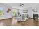 Comfortable living area with hardwood floors, fireplace, and stylish furnishings creating an inviting ambiance at 1614 Prince Edward St, Mount Pleasant, SC 29466