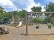 Community playground with swings, slides, and climbing structures, perfect for Gathering fun at 1614 Prince Edward St, Mount Pleasant, SC 29466