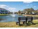 Scenic view of a pond with a fountain, and benches, surrounded by townhomes at 1614 Prince Edward St, Mount Pleasant, SC 29466