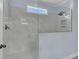 Modern shower featuring marble tile, glass partition, and updated fixtures at 1614 Prince Edward St, Mount Pleasant, SC 29466
