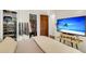 Comfortable bedroom with closet storage and a flat screen TV at 1705 Sulgrave Rd, Charleston, SC 29414