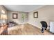 Bright office space with wood floors, neutral walls, and desk area at 1705 Sulgrave Rd, Charleston, SC 29414