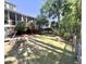 Expansive backyard featuring a fire pit and lush landscaping at 1736 James Basford Pl, Mount Pleasant, SC 29466