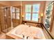 Luxurious bathroom with large tub, walk-in shower, and modern fixtures at 1736 James Basford Pl, Mount Pleasant, SC 29466