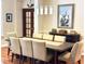 Spacious dining room with large wooden table and elegant chairs at 1736 James Basford Pl, Mount Pleasant, SC 29466