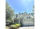 Charming home with a well-manicured lawn and a two-car garage at 1736 James Basford Pl, Mount Pleasant, SC 29466