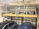 Garage with shelving and storage space for vehicles and equipment at 1736 James Basford Pl, Mount Pleasant, SC 29466