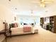 Spacious main bedroom features multiple windows, seating area and entertainment center at 1736 James Basford Pl, Mount Pleasant, SC 29466