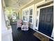 Relaxing front porch with comfortable seating and a welcoming entrance to the home at 1736 James Basford Pl, Mount Pleasant, SC 29466