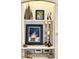Built-in shelf with beautiful decor, framed art and decorative candle stands at 1736 James Basford Pl, Mount Pleasant, SC 29466