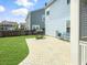 Landscaped backyard with patio, grill, and outdoor seating, perfect for entertaining at 204 Lynx Ln, Summerville, SC 29483