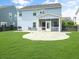 Beautiful backyard with a patio, grill, a screened-in porch, and green lawn area at 204 Lynx Ln, Summerville, SC 29483