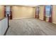 Expansive carpeted bonus room featuring natural light from multiple windows at 204 Lynx Ln, Summerville, SC 29483