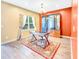 Bright home office featuring a stylish desk, decorative rug, and ample natural light from a large window at 204 Lynx Ln, Summerville, SC 29483