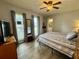 Cozy bedroom featuring natural light, neutral decor, and a glimpse of the attached bathroom at 207 Longstreet St, Summerville, SC 29486