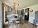 Charming dining area featuring a round table, stylish chairs, and decorative lighting at 207 Longstreet St, Summerville, SC 29486