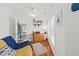 This bedroom features a futon, a mounted TV, and bright windows at 208 Sea Cloud Cir, Edisto Island, SC 29438