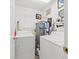 The efficient laundry room features modern appliances and a convenient water heater for added functionality at 208 Sea Cloud Cir, Edisto Island, SC 29438