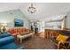 Inviting living space with hardwood floors, bright light, and comfortable furniture at 208 Sea Cloud Cir, Edisto Island, SC 29438