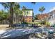 Backyard features mature trees and a refreshing pool, creating a private oasis for relaxing or entertaining at 220 E Arctic Ave, Folly Beach, SC 29439