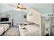 Fun bedroom showcasing a unique bunk bed with a built-in playhouse design at 220 E Arctic Ave, Folly Beach, SC 29439