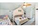 Bright bedroom featuring a unique bunk bed with a built-in playhouse design and beach decor at 220 E Arctic Ave, Folly Beach, SC 29439