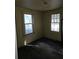 This bedroom features two windows that let in ample natural light, creating a bright and airy space at 2313 Aintree Ave, North Charleston, SC 29405
