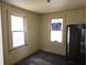 Bedroom with two windows and a 'For Sale' sign at 2313 Aintree Ave, North Charleston, SC 29405