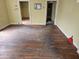 Spacious living room featuring hardwood floors and ample natural light at 2313 Aintree Ave, North Charleston, SC 29405