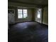 Bright, open living area with hardwood floors and natural light, offering a comfortable and inviting space at 2313 Aintree Ave, North Charleston, SC 29405