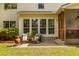 Charming backyard patio featuring comfortable seating, plants, and a peaceful outdoor living space at 2632 Planters Pointe Blvd, Mount Pleasant, SC 29466