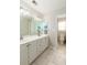 Well-lit bathroom featuring a double sink vanity, ample counter space, and a separate toilet area at 2632 Planters Pointe Blvd, Mount Pleasant, SC 29466