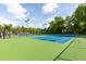 Enjoy a match on this pristine tennis court with well-maintained surface, lighting and surrounding greenery at 2632 Planters Pointe Blvd, Mount Pleasant, SC 29466
