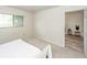 Cozy bedroom features neutral carpet and a window overlooking the outdoors at 2901 Dove Haven Ct # C, Charleston, SC 29414