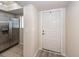 Functional entryway featuring access to the kitchen and stainless steel refrigerator at 2901 Dove Haven Ct # C, Charleston, SC 29414
