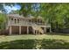 Elevated back deck and screened porch overlooking a spacious yard, ideal for outdoor entertaining and relaxation at 3021 Rushland Mews, Johns Island, SC 29455
