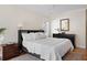 Comfortable bedroom with hardwood flooring, ceiling fan, and dresser at 3021 Rushland Mews, Johns Island, SC 29455